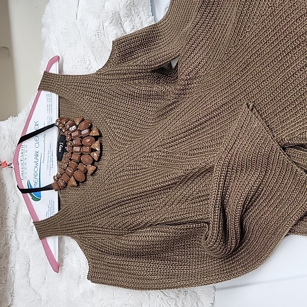 Knit cold shoulder, bell sleeves and flaired dress. Very pretty cocoa brown .